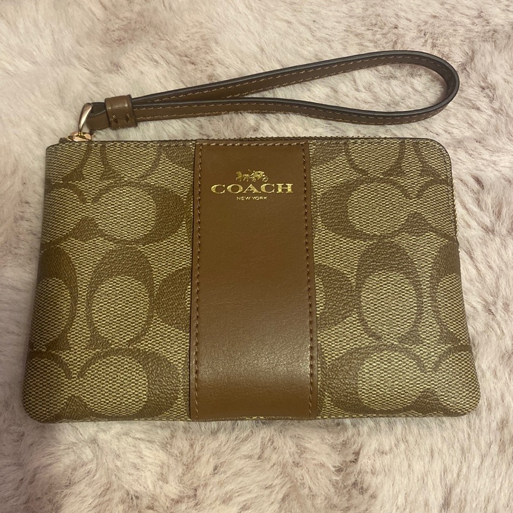 Brand new coach wristlet in brown signature canvas